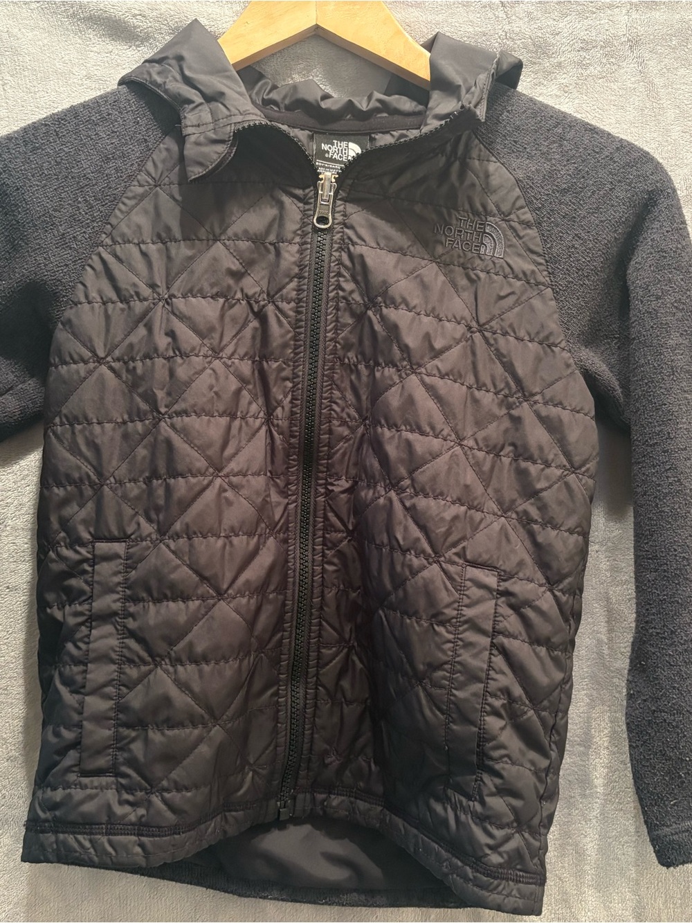 The North Face Kids Black Quilted Puffer Jacket with Fleece Sleeves